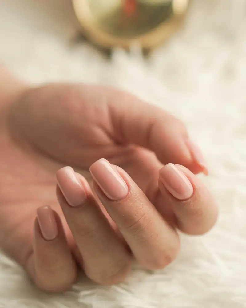 Natural-length round nails in a soft sheer pink