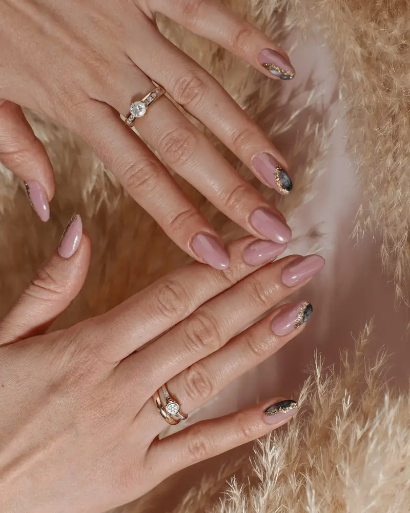 Natural-length almond nails in a sheer nude structured gel