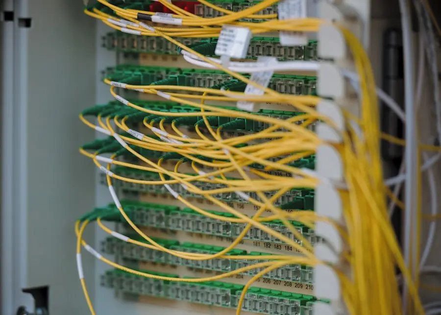 Neatly terminated yellow patch cables in a rack